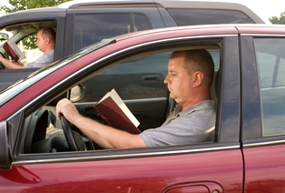 top driving distractions in america reading